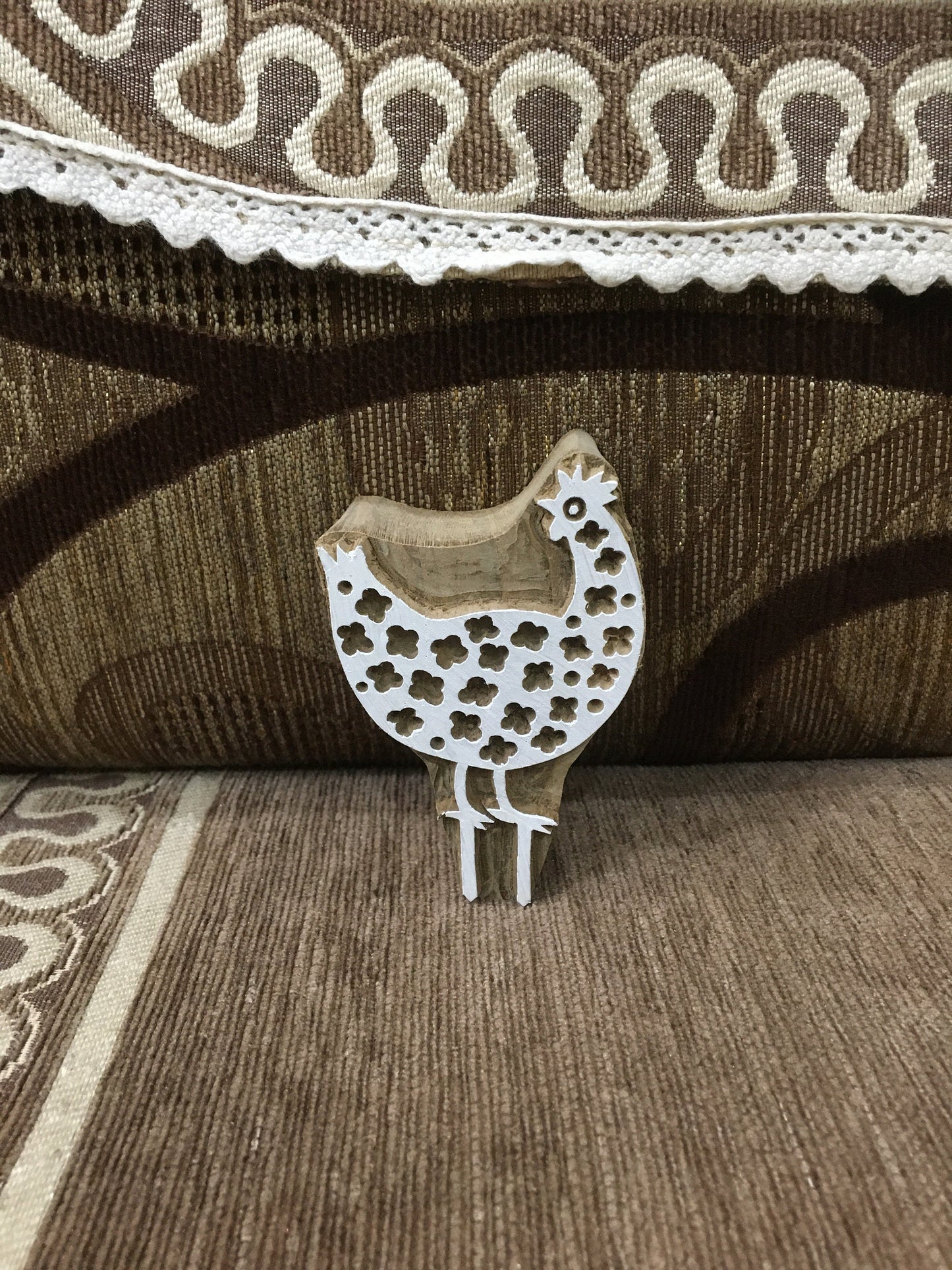 Graceful Hen Perched on Iron Stand: A Rustic Display of Beauty, hand carved Indian wood printing block; textile stamp; pottery stamp,