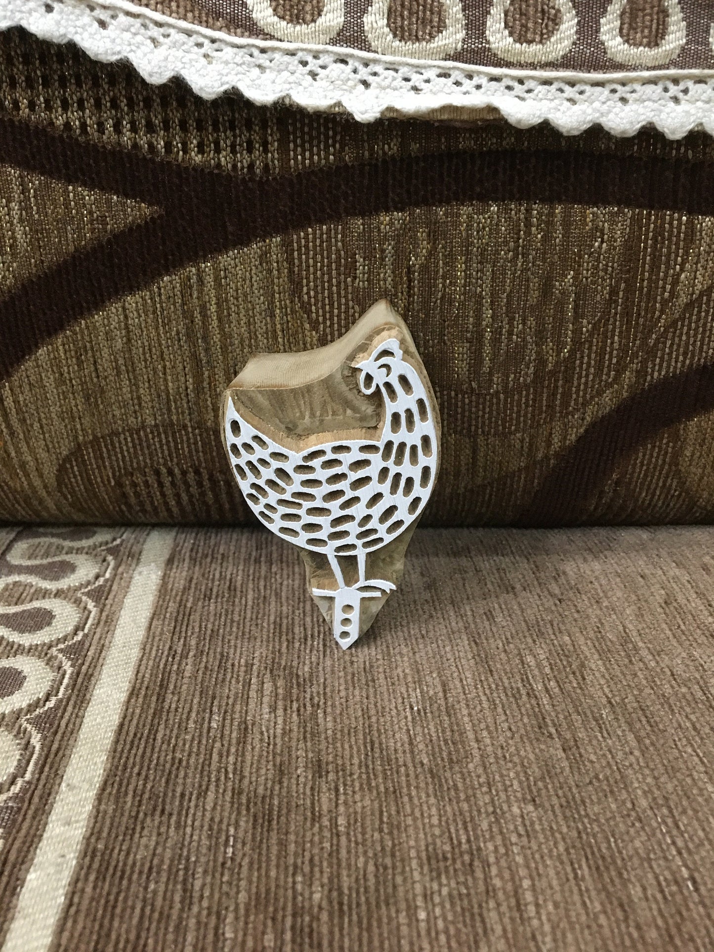 Graceful Hen Perched on Iron Stand: A Rustic Display of Beauty, hand carved Indian wood printing block; textile stamp; pottery stamp,