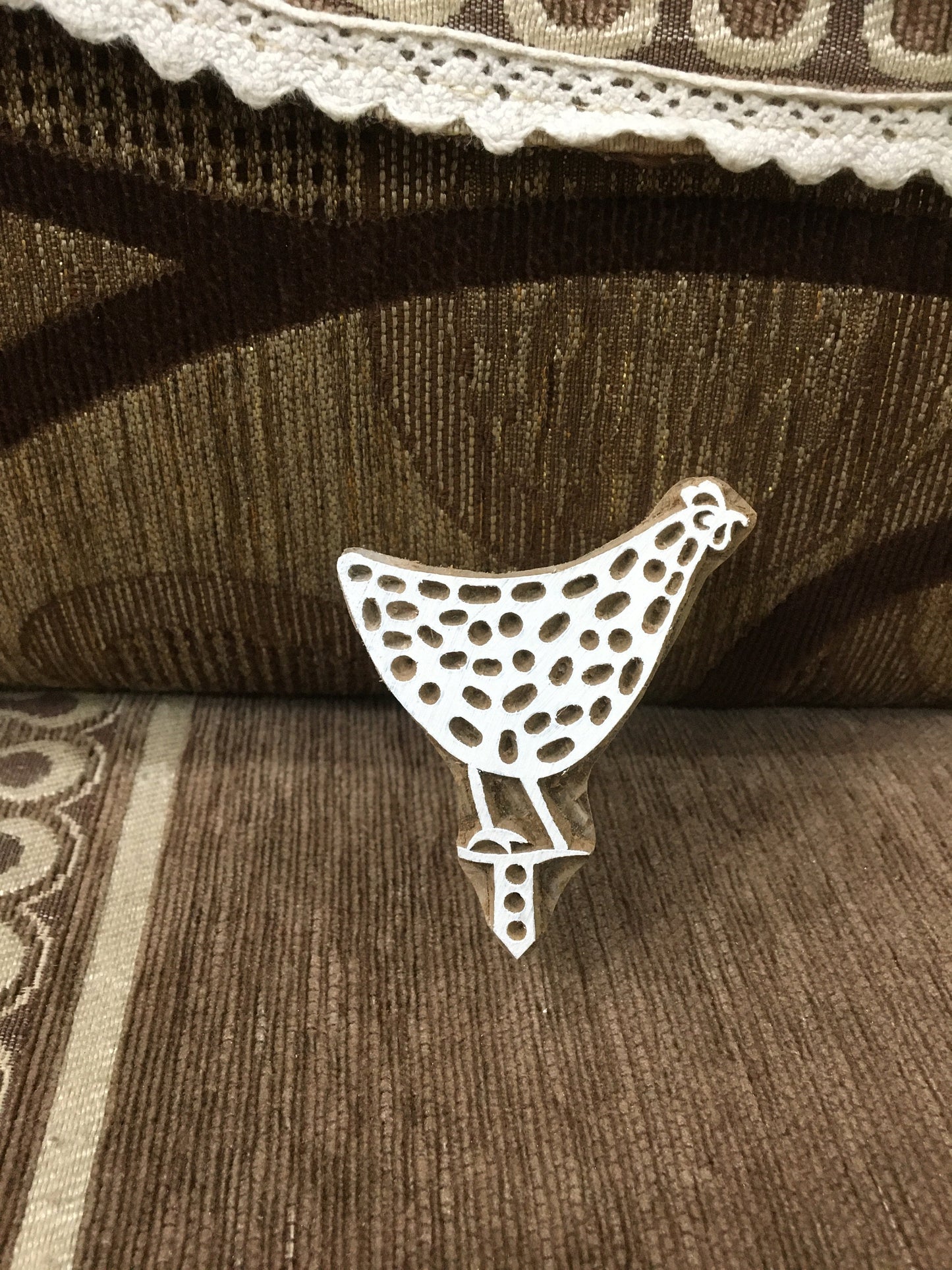 Graceful Hen Perched on Iron Stand: A Rustic Display of Beauty, hand carved Indian wood printing block; textile stamp; pottery stamp,