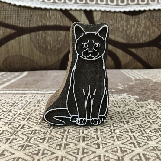 A sitting cat pottery stamp ceramic mould scrapbooking tjap batik printing floral carved stamps.